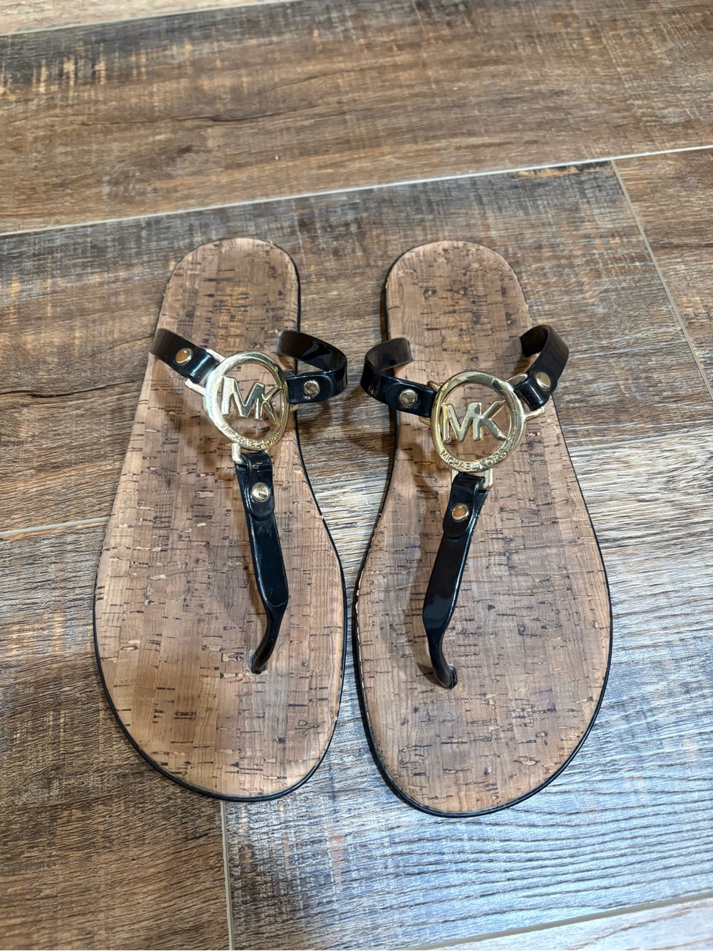 Michael Kors Black Patent Thong Sandals with Gold MK Medallion